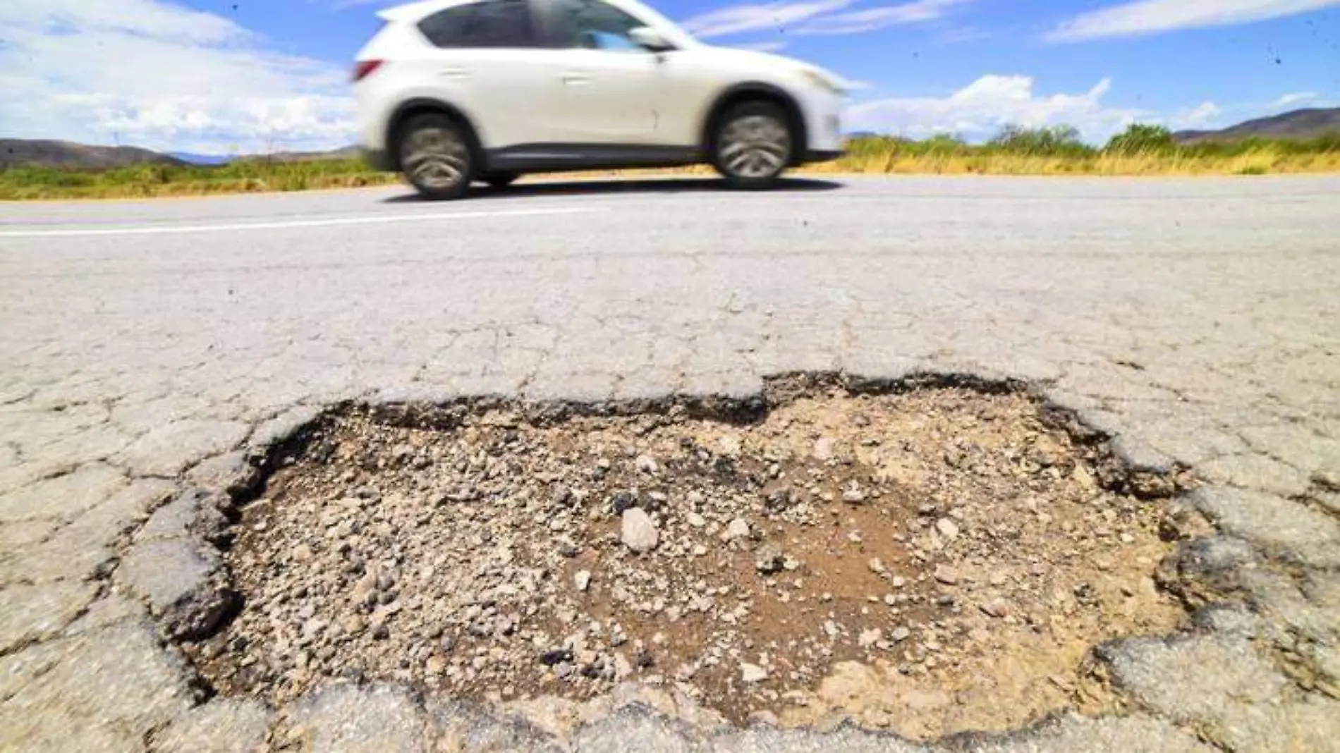 GERA- Baches y grietas carretera a juarez  (8)